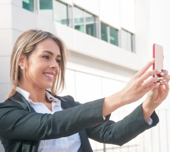 Employee marking attendance with a selfie on mobile
